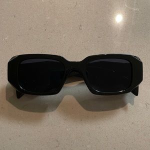 “Prada sunglasses”